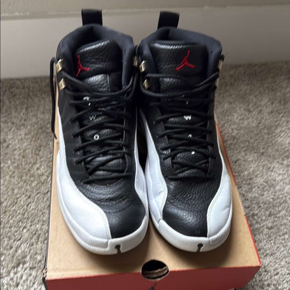 Black and White Sneakers with Red Logo